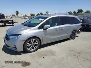 2023 Honda Odyssey Touring with VIN 5FNRL6H86PB043474, listed as a Copart auction lot 61672545 with 39,176 mi miles and Salvage title. Bid and sale history available at DreamBid. Image 1.
