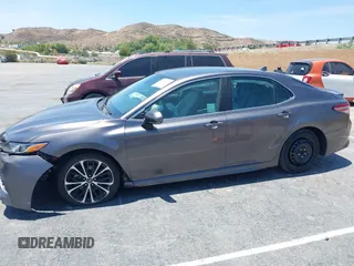 2019 Toyota Camry LE z VIN 4T1B11HK5KU833141, wystawiony jako IAAI lot #42489827 z przebiegiem 24 258 mil mil oraz . Historia ofert i sprzedaży dostępna na DreamBid. Obrazek 14.