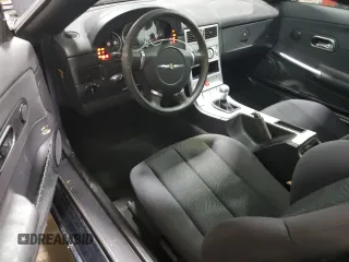 2005 Chrysler Crossfire z VIN 1C3AN59L15X032829, wystawiony jako Copart lot #78370624 z przebiegiem 127 361 mil mil oraz Szkody całkowita. Historia ofert i sprzedaży dostępna na DreamBid. Obrazek 8.