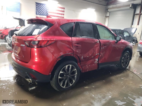 2016 Mazda CX-5 Grand Touring with VIN JM3KE4DY7G0703730, listed as a Copart auction lot 45937475 with 58,748 mi miles and Salvage Title. Bid and sale history available at carsss.com. Image 3.