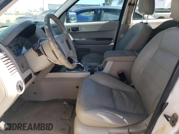 2008 Ford Escape XLT с VIN 1FMCU03128KC70462, выставлен на аукционе Copart как лот 57118055 с пробегом 215 790 миль миль и Списание • Salvage title. История ставок и продаж доступна на DreamBid. Изображение 7.