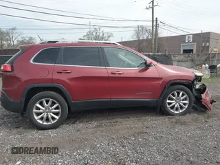 2015 Jeep Cherokee Limited with VIN 1C4PJMDSXFW604627, listed as a IAAI auction lot 42072953 with 102,501 mi miles and . Bid and sale history available at DreamBid. Image 13.