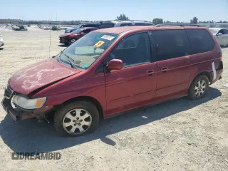 2004 Honda Odyssey EX-RES with VIN 5FNRL18864B083827, listed as a Copart auction lot 60996275 with 234,839 mi miles and Salvage title. Bid and sale history available at DreamBid. Image 1.