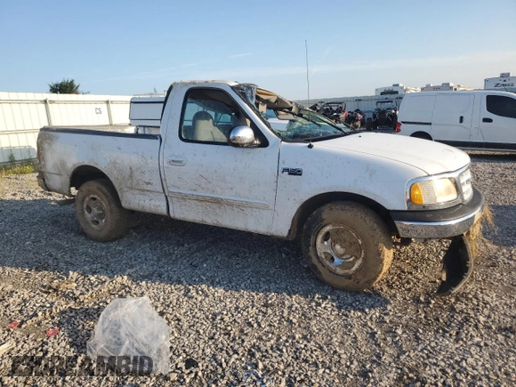 2000 Ford F-150 XL with VIN 1FTZF1727YKB49797, listed as a Copart auction lot 62154595 with Not provided miles and Salvage title. Bid and sale history available at DreamBid. Image 4.