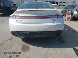 2016 Lincoln MKZ z VIN 3LN6L2G98GR618707, wystawiony jako IAAI lot #42569269 z przebiegiem 159 545 mil mil oraz . Historia ofert i sprzedaży dostępna na DreamBid. Obrazek 17.