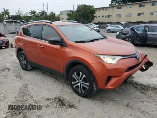 2016 Toyota RAV4 LE with VIN JTMZFREV9GD091819, listed as a Copart auction lot 41958845 with 192,821 mi miles and Salvage Title. Bid and sale history available at carsss.com. Image 4.