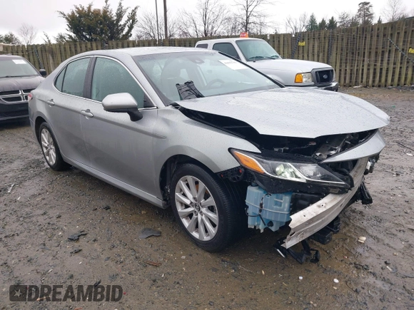 2020 Toyota Camry LE with VIN 4T1C11AK5LU869525, listed as a IAAI auction lot 41693706 with 134,201 mi miles. Bid and sale history available at carsss.com. Image 1.