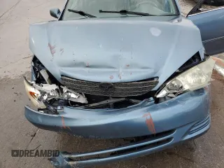2002 Toyota Camry LE z VIN 4T1BE32K92U543686, wystawiony jako Copart lot #57792175 z przebiegiem 187 912 mil mil oraz Nie do naprawy • Non repairable. Historia ofert i sprzedaży dostępna na DreamBid. Obrazek 11.