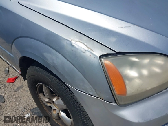 2006 Kia Sorento LX with VIN KNDJD733865509532, listed as a IAAI auction lot 42137155 with 209,149 mi miles and . Bid and sale history available at DreamBid. Image 13.
