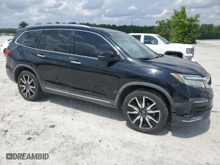 2019 Honda Pilot Touring 8-Passenger with VIN 5FNYF5H94KB029572, listed as a Copart auction lot 54363265 with 149,825 mi miles and Salvage Title. Bid and sale history available at carsss.com. Image 4.