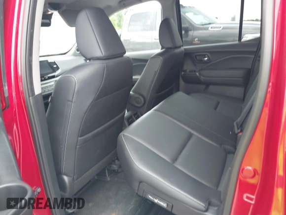 2023 Honda Ridgeline RTL with VIN 5FPYK3F53PB059323, listed as a IAAI auction lot 42485621 with Not provided miles and . Bid and sale history available at DreamBid. Image 8.