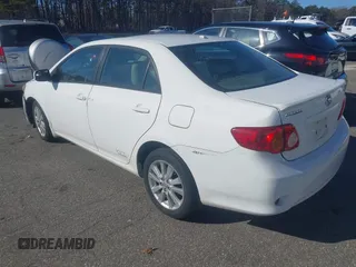 2009 Toyota Corolla with VIN 1NXBU40E59Z070160, listed as a IAAI auction lot 41887778 with 185,133 mi miles. Bid and sale history available at carsss.com. Image 3.