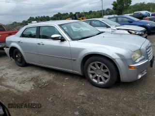 2006 Chrysler 300 C with VIN 2C3LA63H06H527558, listed as a Copart auction lot 64665314 with 74,237 mi miles and Salvage Title. Bid and sale history available at carsss.com. Image 4.