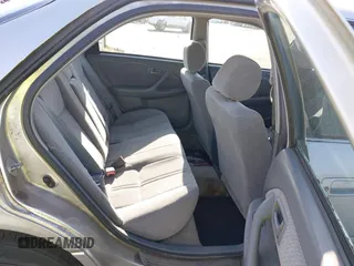 2001 Toyota Camry LE z VIN JT2BF22K210301509, wystawiony jako IAAI lot #42078365 z przebiegiem 322 169 mil mil oraz . Historia ofert i sprzedaży dostępna na DreamBid. Obrazek 8.