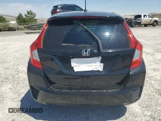 2015 Honda Fit LX z VIN 3HGGK5H52FM759746, wystawiony jako Copart lot #60486535 z przebiegiem 64 295 mil mil oraz Szkoda całkowita • Salvage title. Historia ofert i sprzedaży dostępna na DreamBid. Obrazek 6.