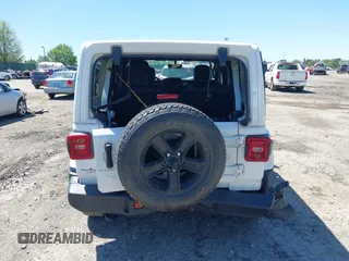 2021 Jeep Wrangler Unlimited Sahara z VIN 1C4HJXEN2MW528137, wystawiony jako IAAI lot #42134514 z przebiegiem 50 030 mil mil oraz . Historia ofert i sprzedaży dostępna na DreamBid. Obrazek 17.