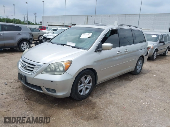 2009 Honda Odyssey Touring z VIN 5FNRL38979B052923, wystawiony jako IAAI lot #42427207 z przebiegiem 201 483 mil mil oraz . Historia ofert i sprzedaży dostępna na DreamBid. Obrazek 22.