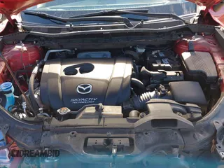 2016 Mazda CX-5 Touring with VIN JM3KE4CY5G0630438, listed as a IAAI auction lot 41877660 with 56,960 mi miles. Bid and sale history available at carsss.com. Image 10.