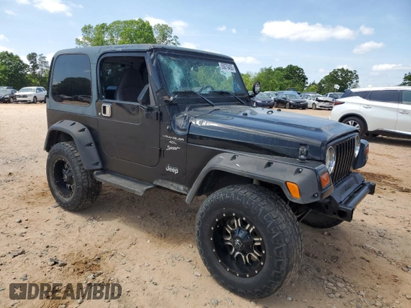 1999 Jeep Wrangler Sport with VIN 1J4FY19S9XP423684, listed as a Copart auction lot 55079455 with 149,756 mi miles and Salvage Title. Bid and sale history available at carsss.com. Image 4.