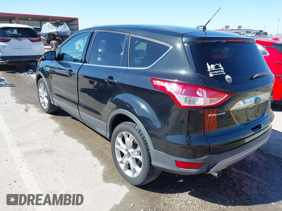 2013 Ford Escape SEL with VIN 1FMCU0HX4DUB31123, listed as a IAAI auction lot 41740392 with 171,239 mi miles. Bid and sale history available at carsss.com. Image 3.