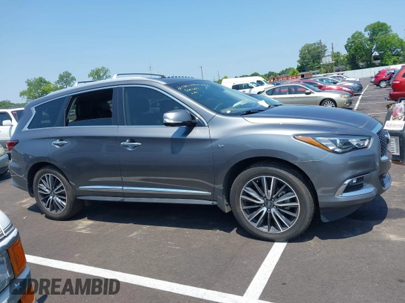 2019 Infiniti QX60 Pure with VIN 5N1DL0MN7KC563655, listed as a IAAI auction lot 42469111 with 84,864 mi miles and . Bid and sale history available at DreamBid. Image 12.