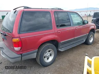 1998 Ford Explorer XL z VIN 1FMZU34E7WUA07656, wystawiony jako IAAI lot #42522560 z przebiegiem 187 244 mil mil oraz . Historia ofert i sprzedaży dostępna na DreamBid. Obrazek 4.