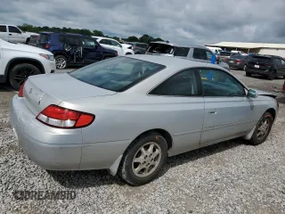 2000 Toyota Solara SE z VIN 2T1CG22P4YC340204, wystawiony jako Copart lot #56932265 z przebiegiem 168 041 mil mil oraz Czysty tytuł • Clean title. Historia ofert i sprzedaży dostępna na DreamBid. Obrazek 3.