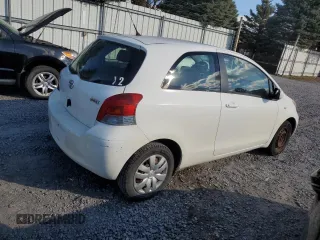 2011 Toyota Yaris with VIN JTDJT4K30B5331855, listed as a Copart auction lot 80080874 with 258,070 mi miles and Clean Title. Bid and sale history available at carsss.com. Image 3.