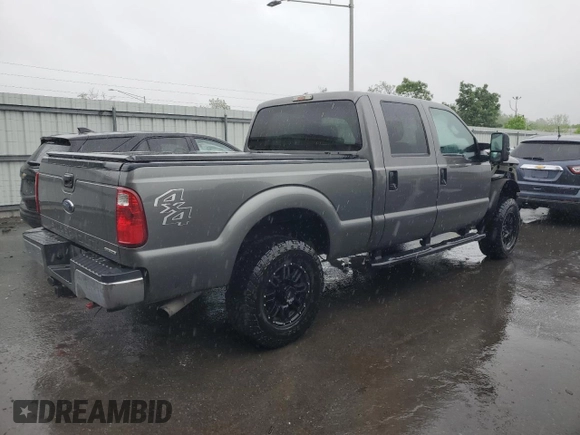 2014 Ford F-250 XL with VIN 1FT7W2B60EEA33908, listed as a Copart auction lot 54752765 with 215,428 mi miles and Salvage title. Bid and sale history available at DreamBid. Image 3.