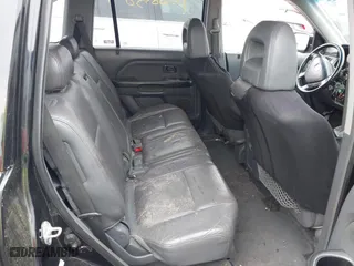 2005 Honda Pilot EX-L with NAVI with VIN 2HKYF187X5H572423, listed as a IAAI auction lot 42088750 with 203,265 mi miles. Bid and sale history available at carsss.com. Image 8.