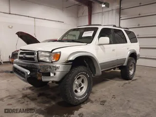 1999 Toyota 4Runner Limited with VIN JT3HN87R2X0251981, listed as a IAAI auction lot 41626489 with 222,471 mi miles. Bid and sale history available at carsss.com. Image 20.