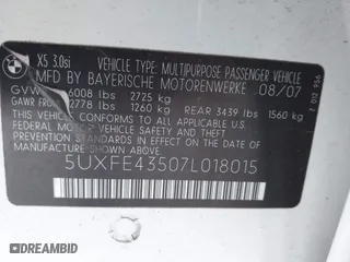 2007 BMW X5 3.0si with VIN 5UXFE43507L018015, listed as a IAAI auction lot 41880668 with 150,329 mi miles. Bid and sale history available at carsss.com. Image 9.