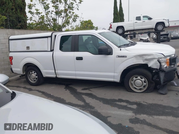 2018 Ford F-150 XL with VIN 1FTEX1CP5JKE02604, listed as a IAAI auction lot 42490050 with 171,521 mi miles and . Bid and sale history available at DreamBid. Image 13.