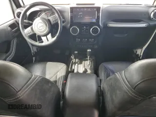 2015 Jeep Wrangler Unlimited Sahara with VIN 1C4BJWEG7FL768712, listed as a Copart auction lot 49963335 with 100,053 mi miles and Salvage Title. Bid and sale history available at carsss.com. Image 8.