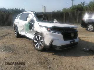 2024 Honda Pilot Touring with VIN 5FNYG1H70RB038106, listed as a IAAI auction lot 42281146 with Not provided miles and . Bid and sale history available at DreamBid. Image 1.