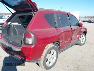 2016 Jeep Compass Latitude with VIN 1C4NJDEB1GD662807, listed as a IAAI auction lot 41161996 with 128,030 mi miles. Bid and sale history available at carsss.com. Image 4.