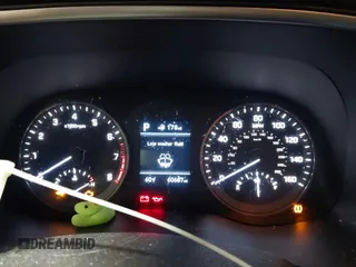 2020 Hyundai Tucson Value z VIN KM8J3CA40LU163884, wystawiony jako IAAI lot #41780266 z przebiegiem 60 687 mil mil oraz . Historia ofert i sprzedaży dostępna na DreamBid. Obrazek 7.