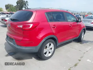 2013 Kia Sportage LX with VIN KNDPBCA26D7355889, listed as a IAAI auction lot 42054415 with 136,859 mi miles and . Bid and sale history available at carsss.com. Image 4.