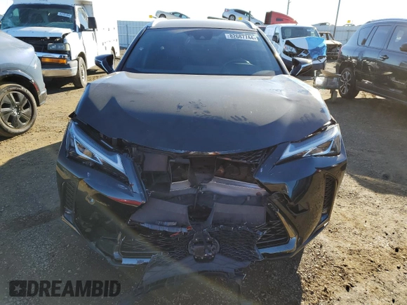2021 Lexus UX with VIN JTHE9JBH0M2036963, listed as a Copart auction lot 82687744 with 24,857 mi miles and Salvage Title. Bid and sale history available at carsss.com. Image 5.