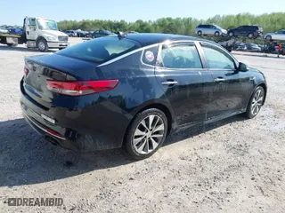 2018 Kia Optima S with VIN 5XXGT4L32JG253680, listed as a IAAI auction lot 41982361 with 204,237 mi miles. Bid and sale history available at carsss.com. Image 4.