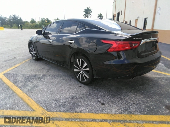2016 Nissan Maxima SR with VIN 1N4AA6AP9GC428938, listed as a IAAI auction lot 42419663 with 121,501 mi miles and . Bid and sale history available at DreamBid. Image 3.