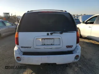 2005 GMC Envoy SLE с VIN 1GKDS13S852261326, выставлен на аукционе Copart как лот 42650025 с пробегом 210 485 миль миль и Списание • Salvage title. История ставок и продаж доступна на DreamBid. Изображение 6.