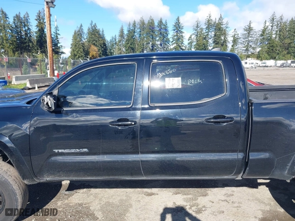 2016 Toyota Tacoma SR5 with VIN 5TFDZ5BN7GX001869, listed as a IAAI auction lot 40610002 with 184,380 mi miles. Bid and sale history available at carsss.com. Image 14.