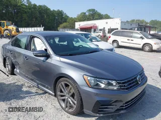 2016 Volkswagen Passat 1.8T S with VIN 1VWAT7A37GC062532, listed as a IAAI auction lot 40267187 with 108,340 mi miles. Bid and sale history available at carsss.com. Image 1.