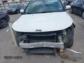 2020 Jeep Compass Latitude z VIN 3C4NJCBB9LT126299, wystawiony jako IAAI lot #42206657 z przebiegiem 60 550 mil mil oraz . Historia ofert i sprzedaży dostępna na DreamBid. Obrazek 13.