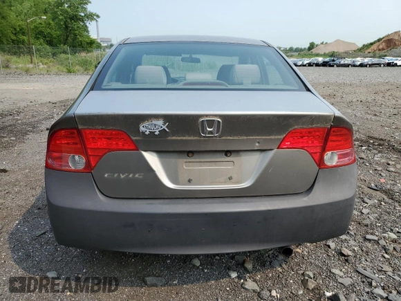 2006 Honda Civic LX z VIN 2HGFA165X6H518462, wystawiony jako Copart lot #59694195 z przebiegiem 101 556 mil mil oraz Czysty tytuł • Clean title. Historia ofert i sprzedaży dostępna na DreamBid. Obrazek 6.