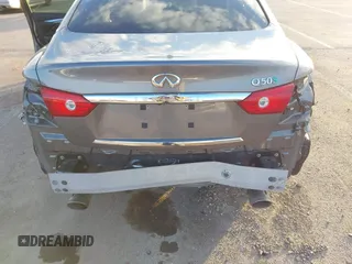 2014 Infiniti Q50 Hybrid Sport with VIN JN1AV7AP4EM691658, listed as a IAAI auction lot 41164910 with 90,521 mi miles and . Bid and sale history available at DreamBid. Image 18.