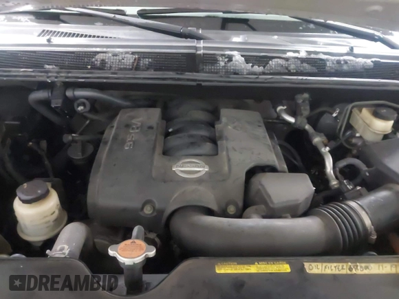 2006 Nissan Titan LE z VIN 1N6BA07B26N572273, wystawiony jako IAAI lot #41252390 z przebiegiem 88 457 mil mil oraz . Historia ofert i sprzedaży dostępna na DreamBid. Obrazek 10.