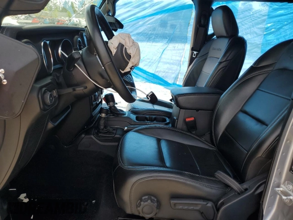 2021 Jeep Wrangler Unlimited Sahara Altitude with VIN 1C4HJXEN3MW691220, listed as a Copart auction lot 56334695 with 46,589 mi miles and Salvage title. Bid and sale history available at DreamBid. Image 7.