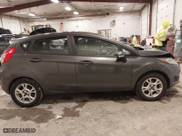 2015 Ford Fiesta SE with VIN 3FADP4EJ8FM138306, listed as a IAAI auction lot 41227124 with 106,741 mi miles. Bid and sale history available at carsss.com. Image 13.